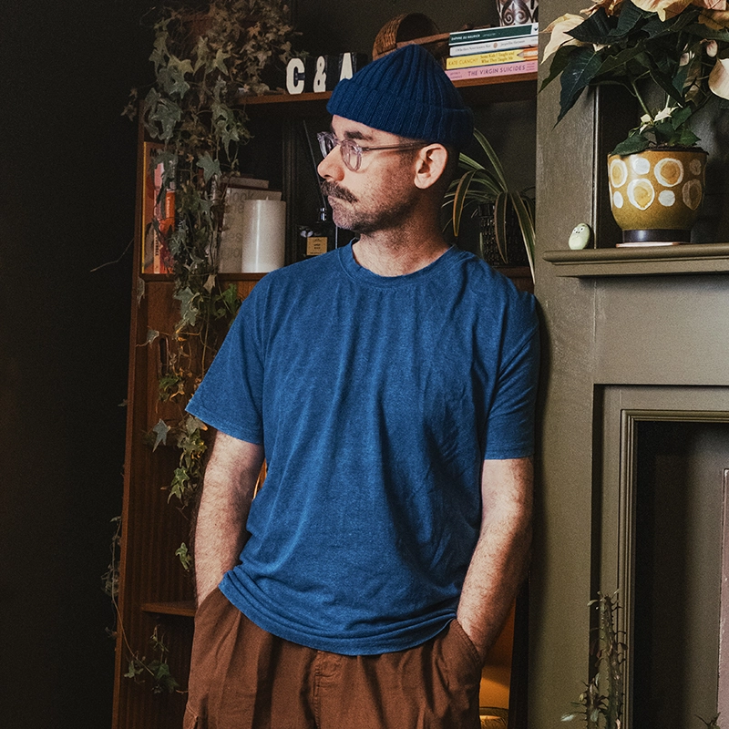 man wearing a natural indigo t shirt