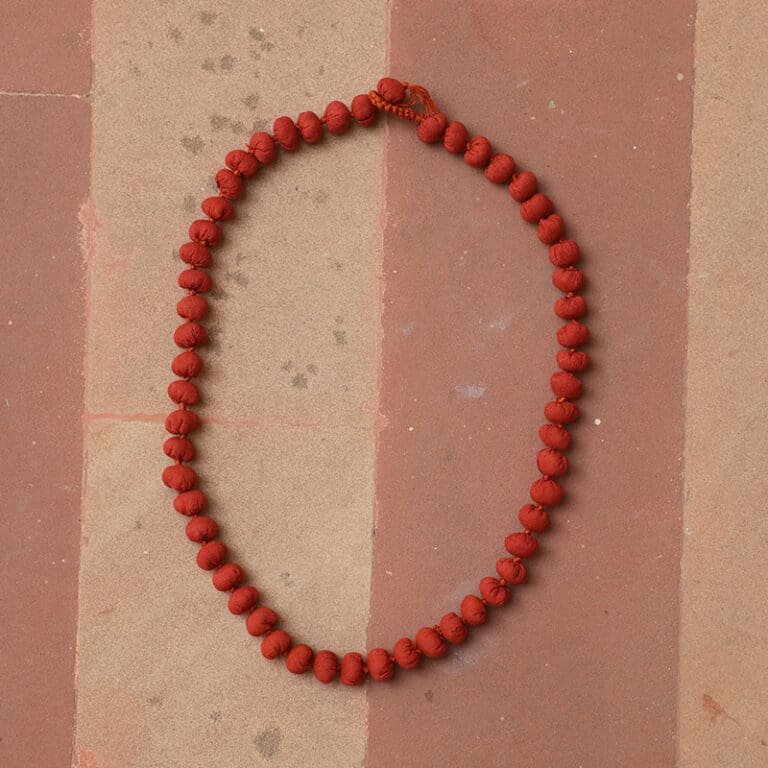 red bead necklace