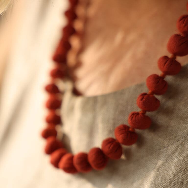 red bead necklace