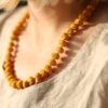 Naturally dyed cotton bead necklace - Ocra