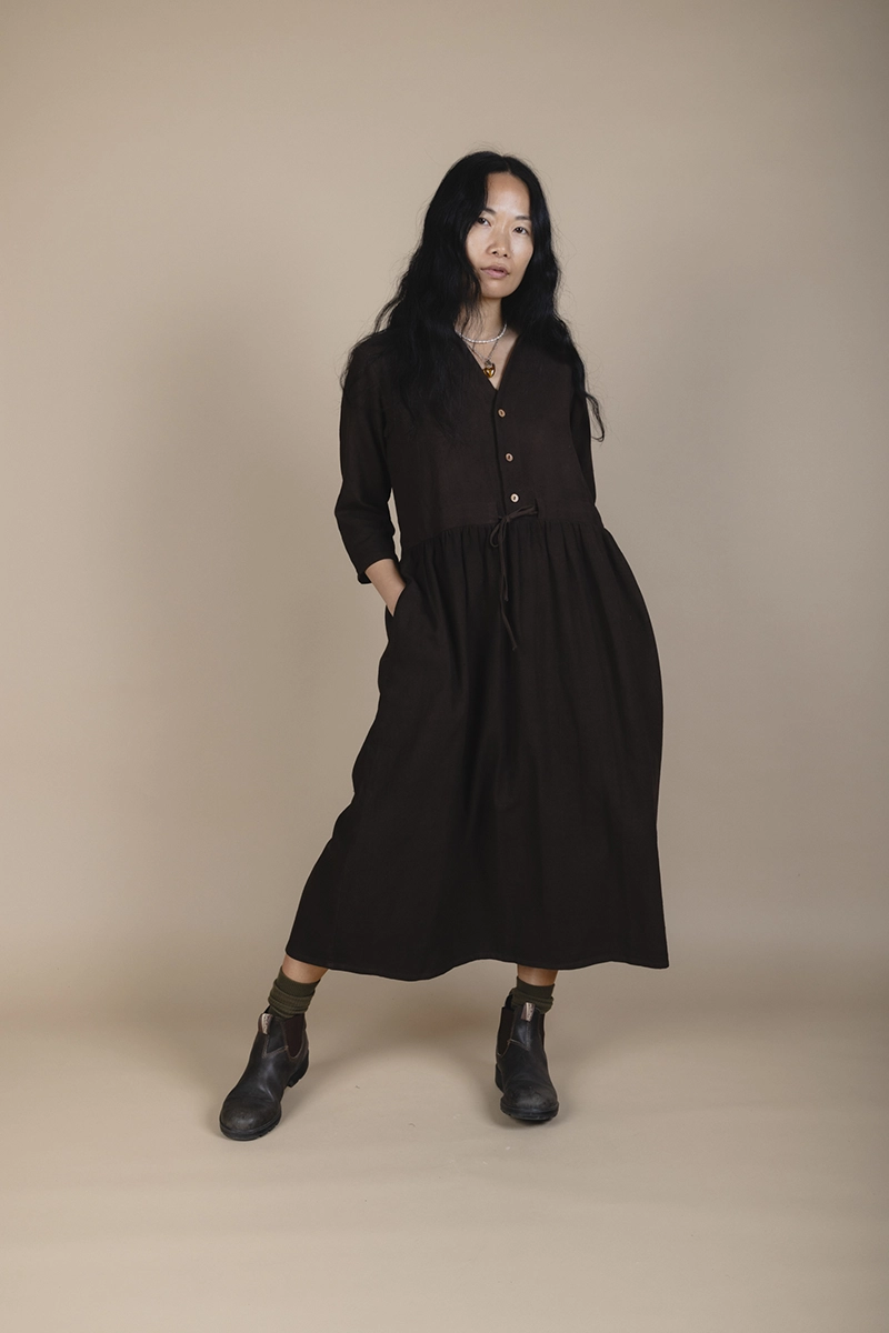 woman wearing dark brown dress