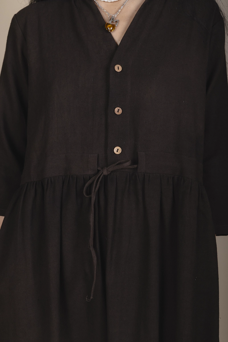 zoom in of brown dress detail