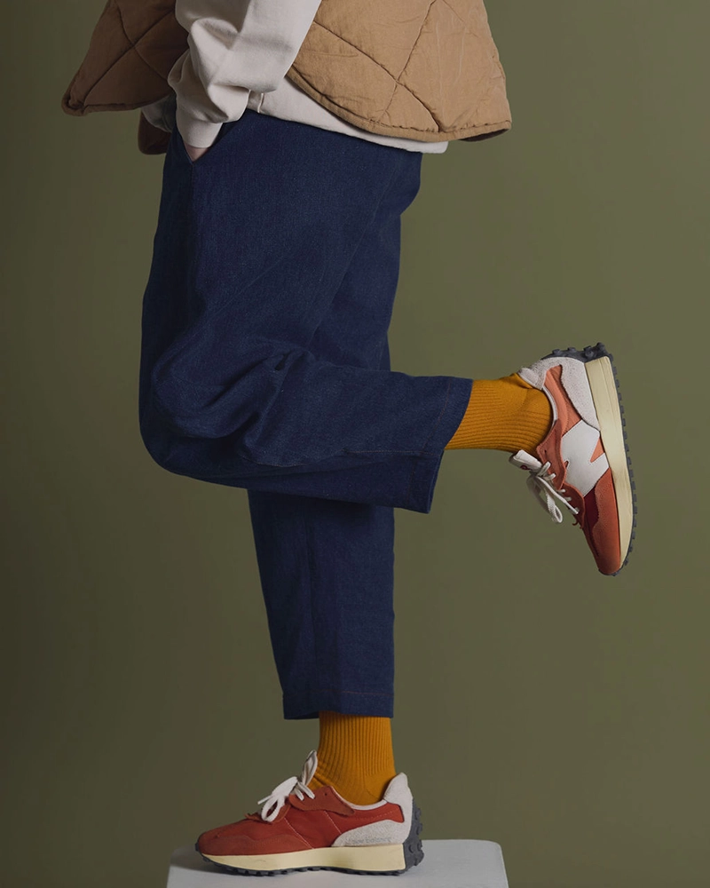 woman wearing pull on denim trousers