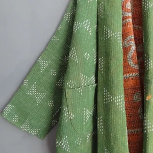zoom in of green kantha fabric jacket