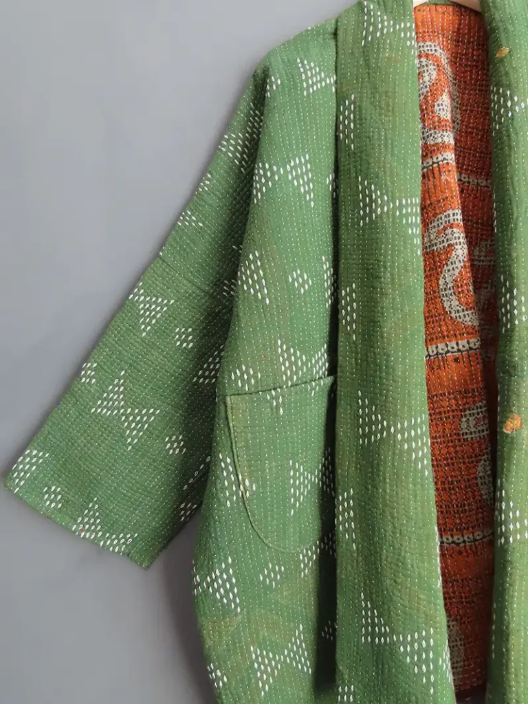 zoom in of green kantha fabric jacket