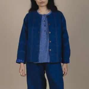 patchwork denim jacket on woman with long dark hair