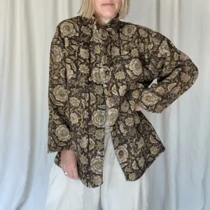 woman wearing black floral vintage kantha