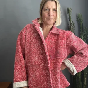 pink kantha jacket on woman