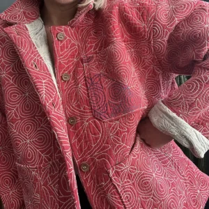 close up of pink kantha stitching