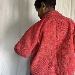 woman wearing pink kantha chore jacket