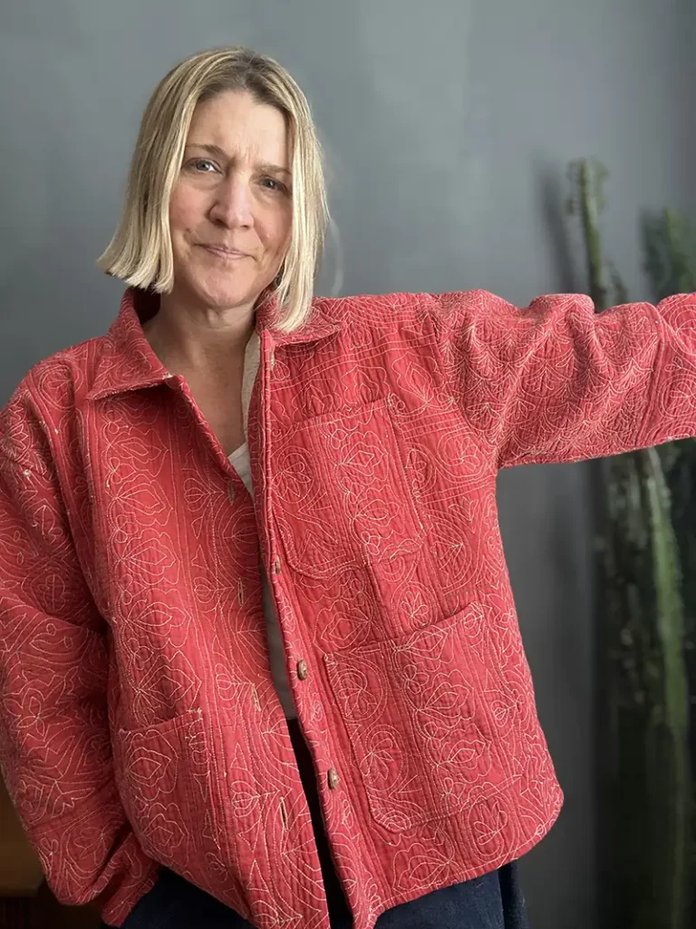 pink kantha quilted jacket on woman