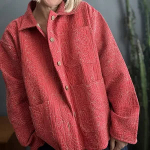 zoom in of pink sujani kantha stitching