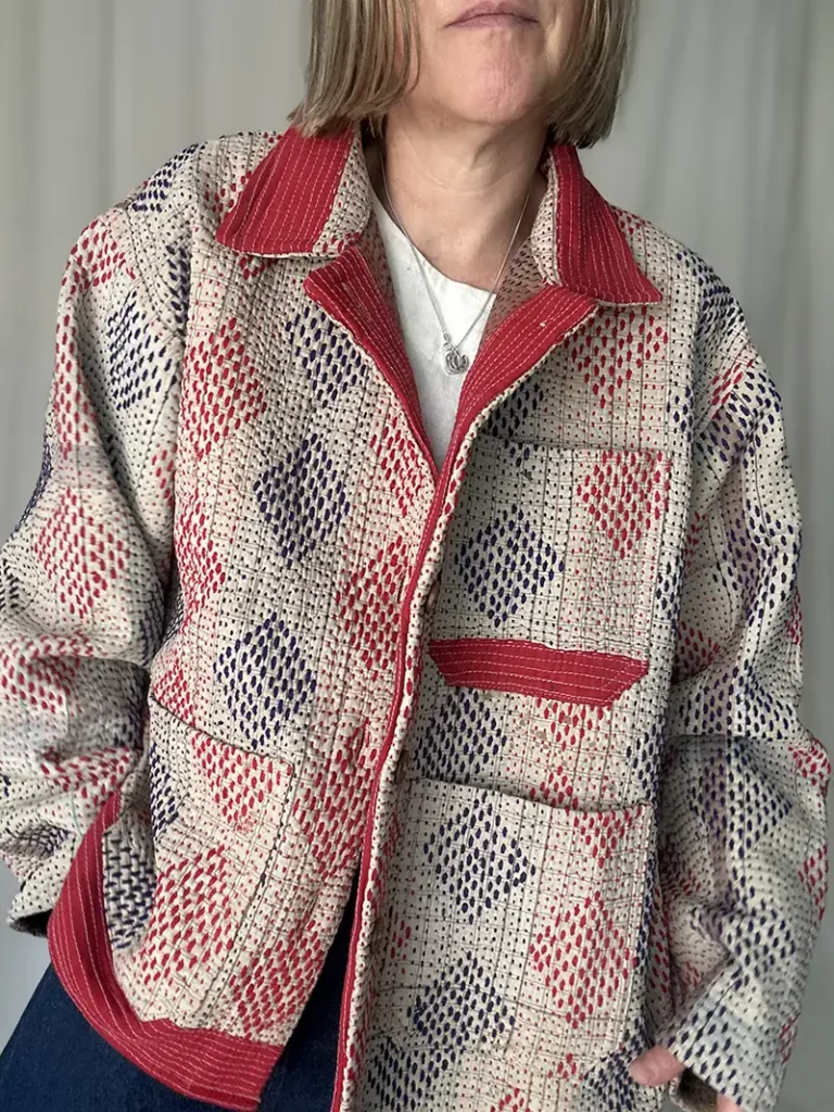 woman wearing a kantha chore jacket