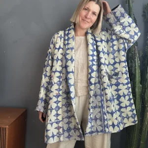 woman wearing a vintage kantha jacket
