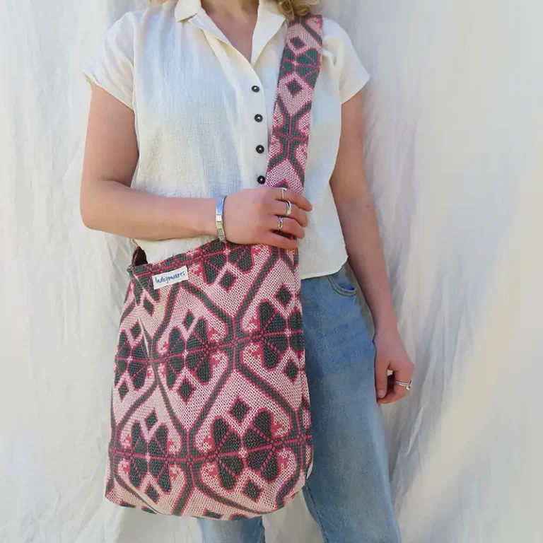 woman wearing fabric sling bag