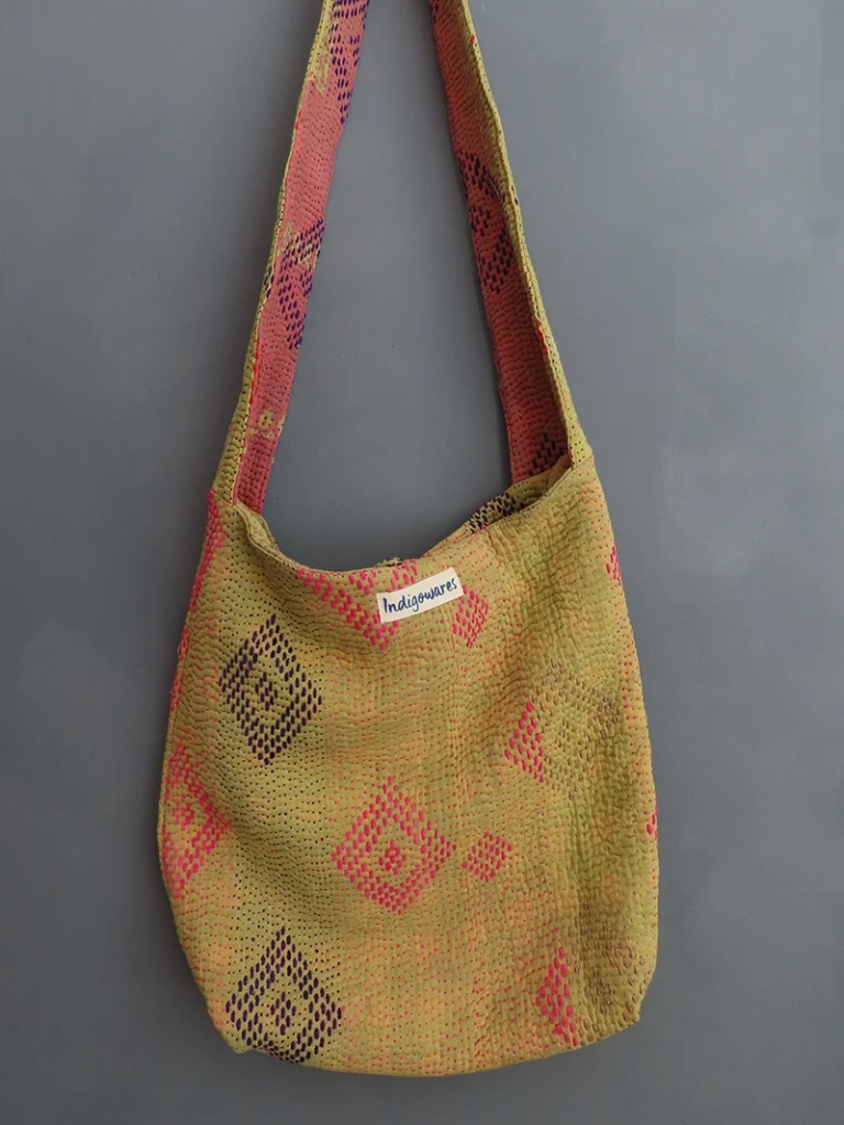 zoom in of yellow kantha embrodery fabric bag