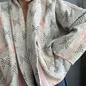 close up view of vintage kantha fabric stitching
