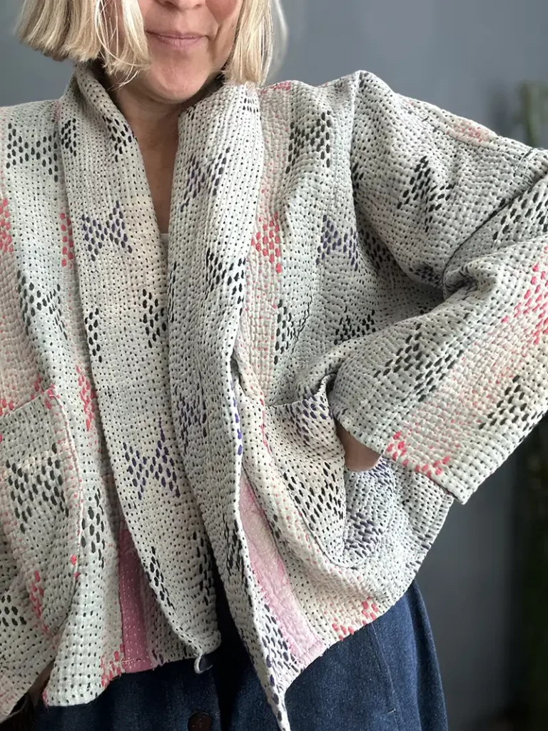 close up view of vintage kantha fabric stitching