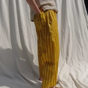 woman wearing yellow cotton trousers