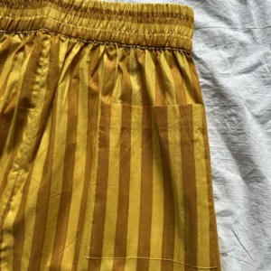 yellow striped pull on trousers