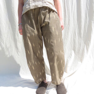 woman wearing khaki cotton trousers