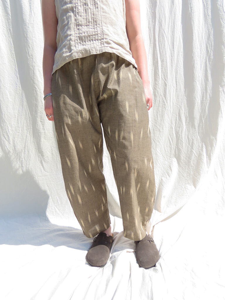 woman wearing khaki cotton trousers