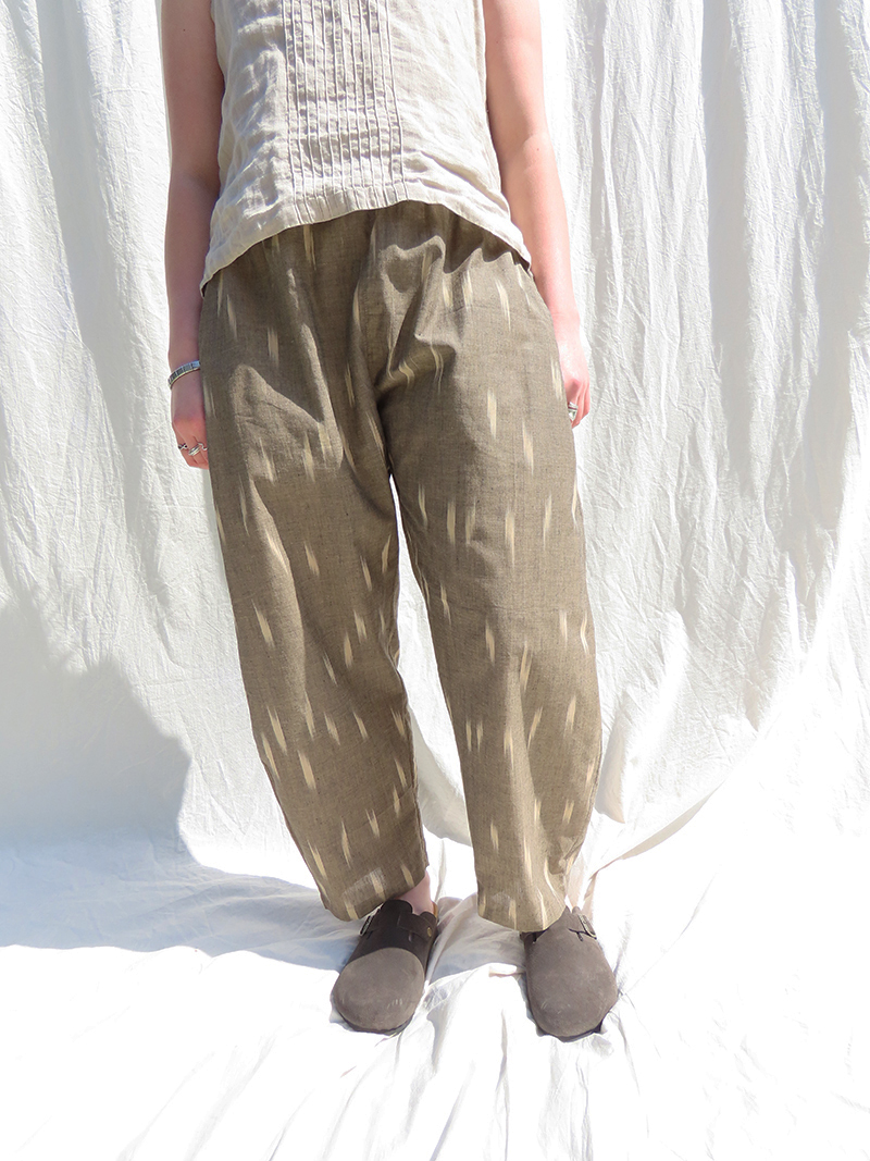 woman wearing khaki cotton trousers