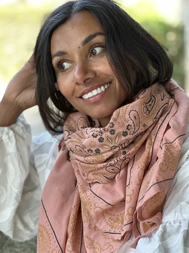 woman wearing a pink cotton bandana scarf