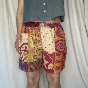 woman wearing patchwork boho festival shorts