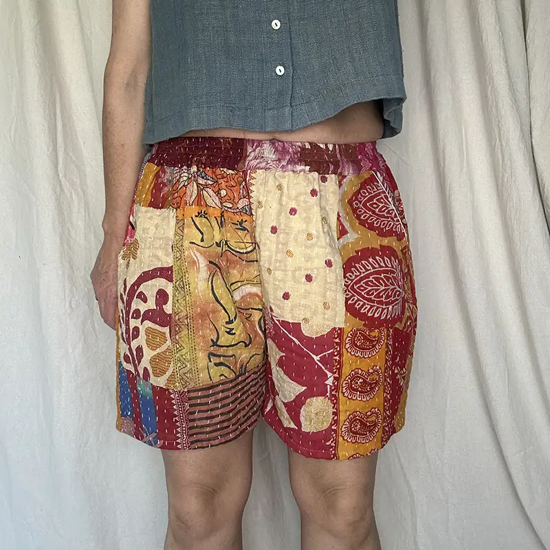 woman wearing patchwork boho festival shorts