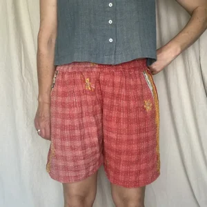 woman wearing pink boho festival shorts