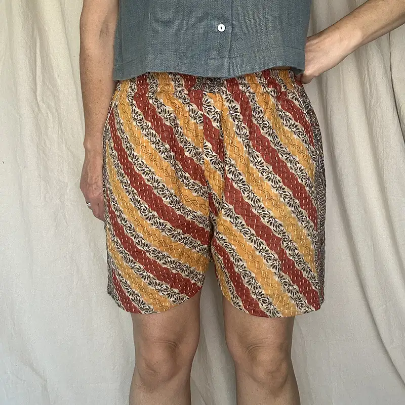 woman wearing pull on striped boho festival shorts