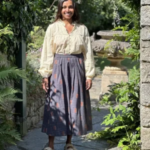 woman wearing full mid length gathered cotton skirt