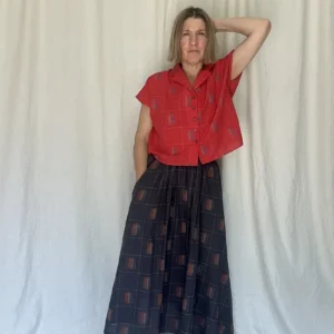 woman wearing Sustainable check midi skirt