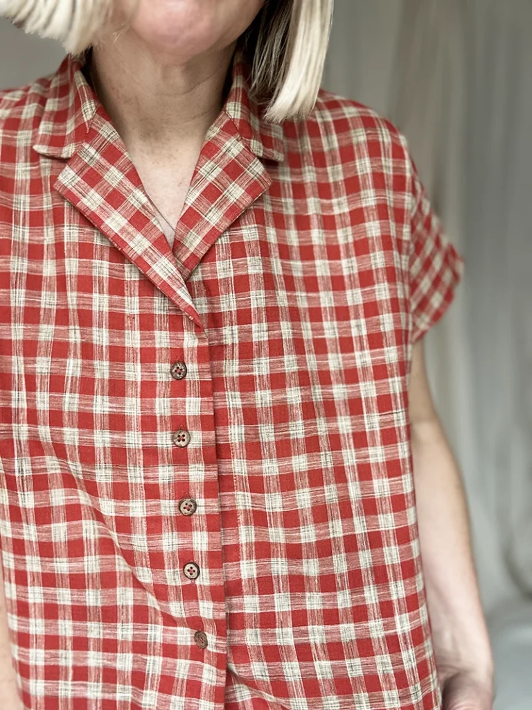 zoom in of woven check on woman wearing Handloom Kala cotton shirt