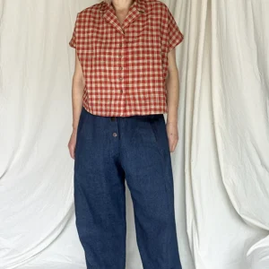 woman wearing Sustainable organic cotton shirt with indigo jeans