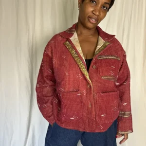 woman wearing a wine colour kantha stitched chore jacket
