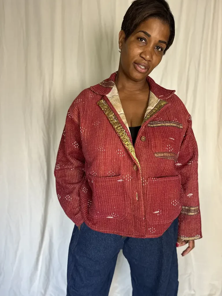 woman wearing a wine colour kantha stitched chore jacket