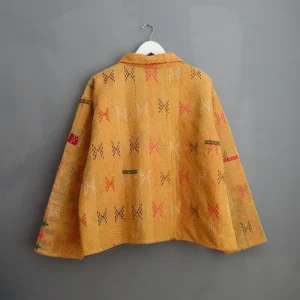 back view of a yellow kantha chore jacket