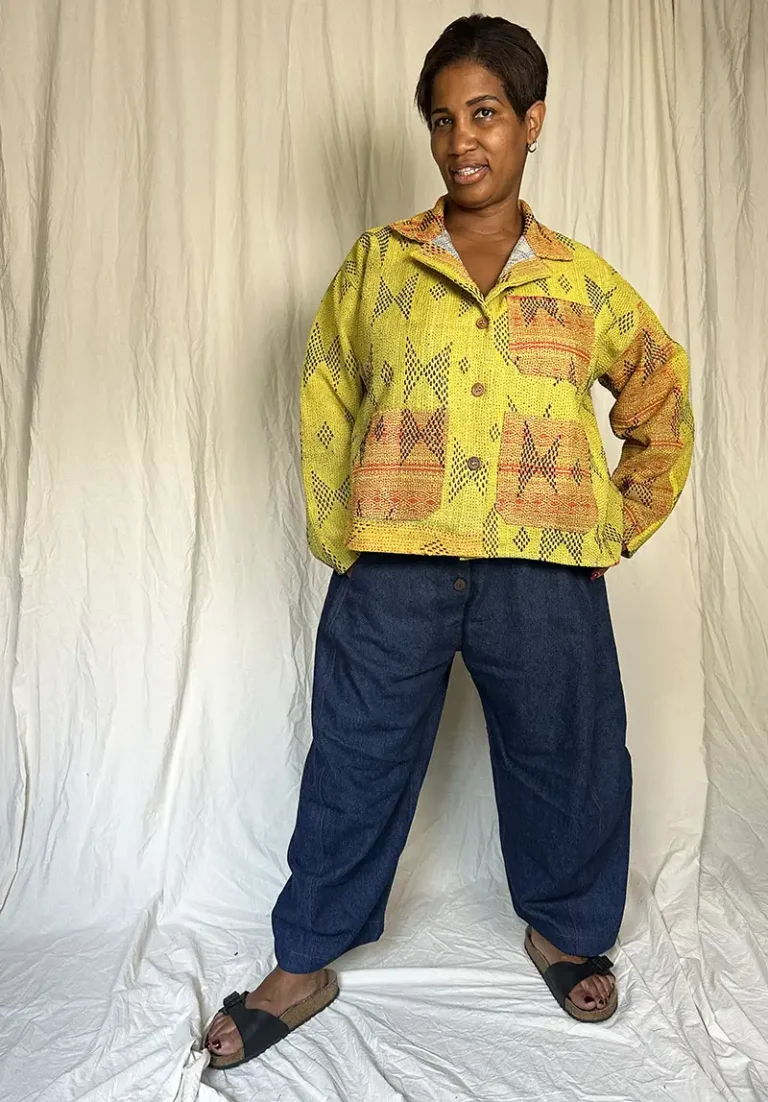 woman wearing a yellow kantha chore jacket