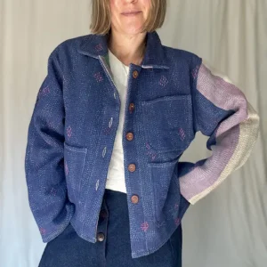 woman wearing a indigo kantha chore jacket