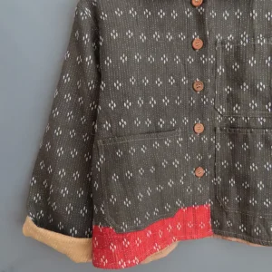 zoom in of black kantha chore jacket with kantha embroidery