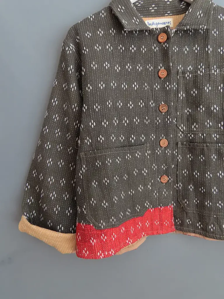 zoom in of black kantha chore jacket with kantha embroidery