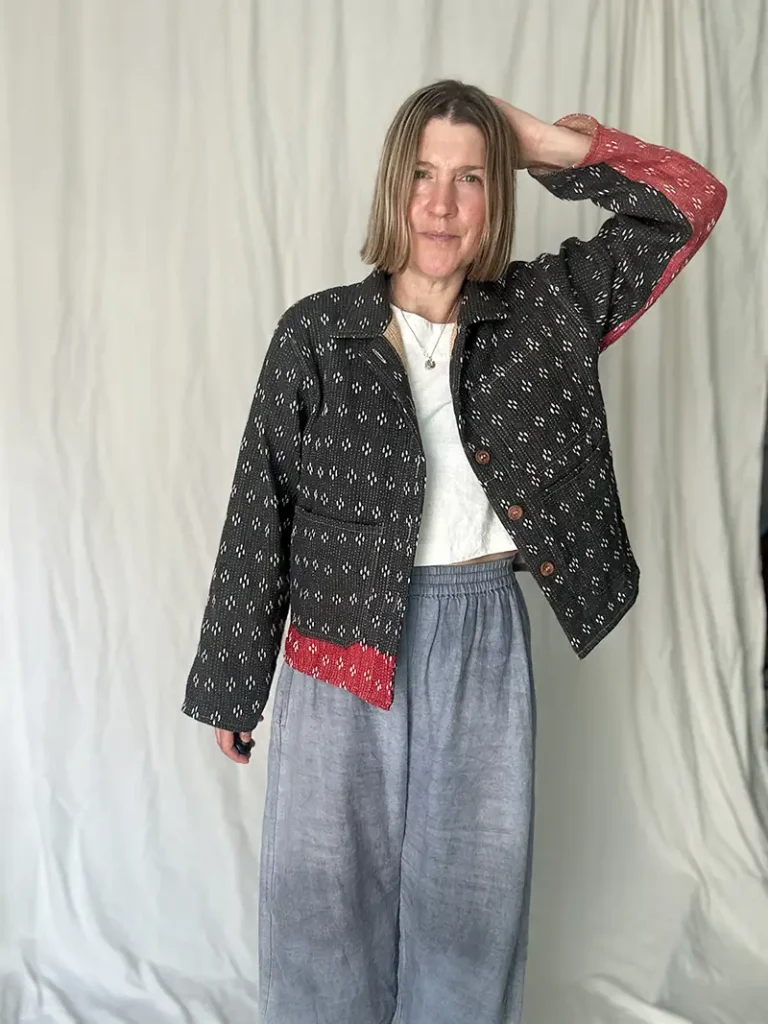 woman wearing a black chore jacket