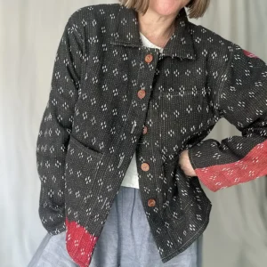 woman wearing a button up kantha jacket