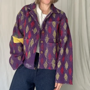 woman wearing purple pattern kantha chore jacket