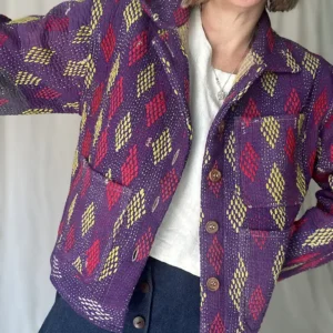zoom in woman wearing purple pattern kantha chore jacket