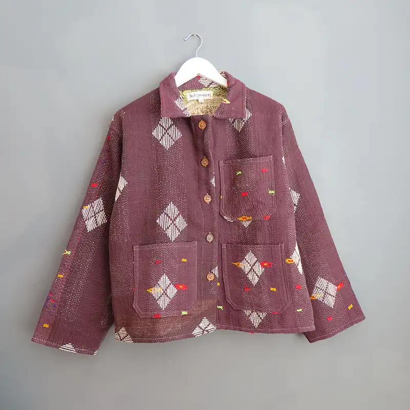 purple kantha chore jacket on wall