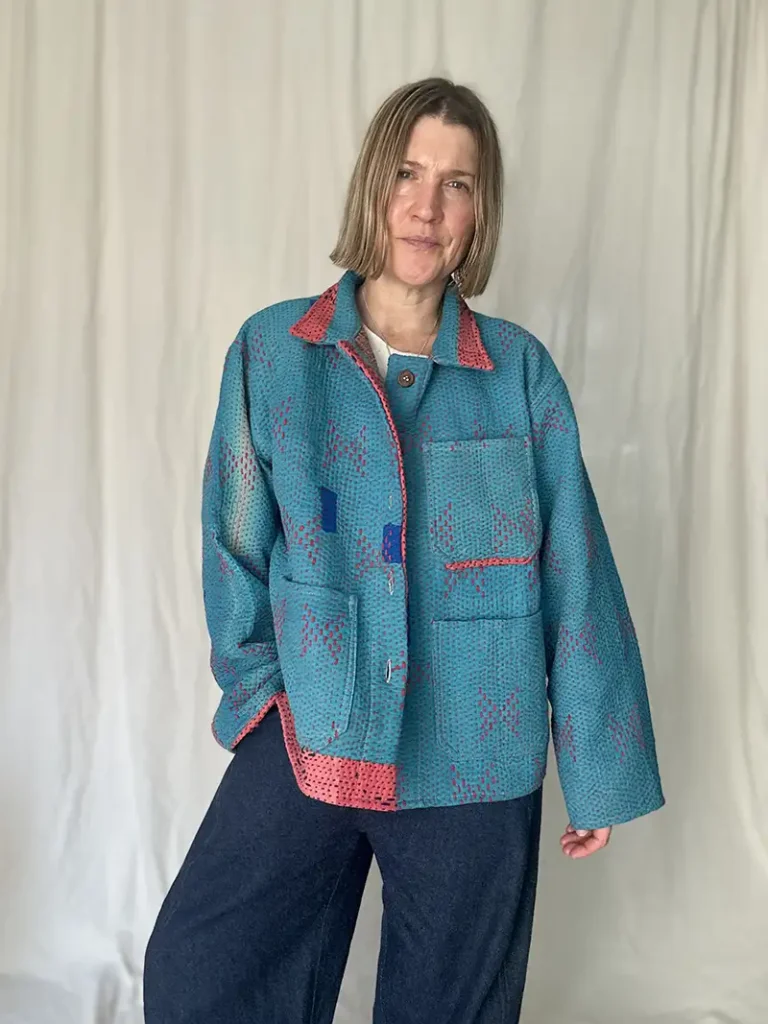 woman wearing sky blue kantha chore jacket