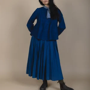 full length picture of woman wearing indigo dyed cotton shirt